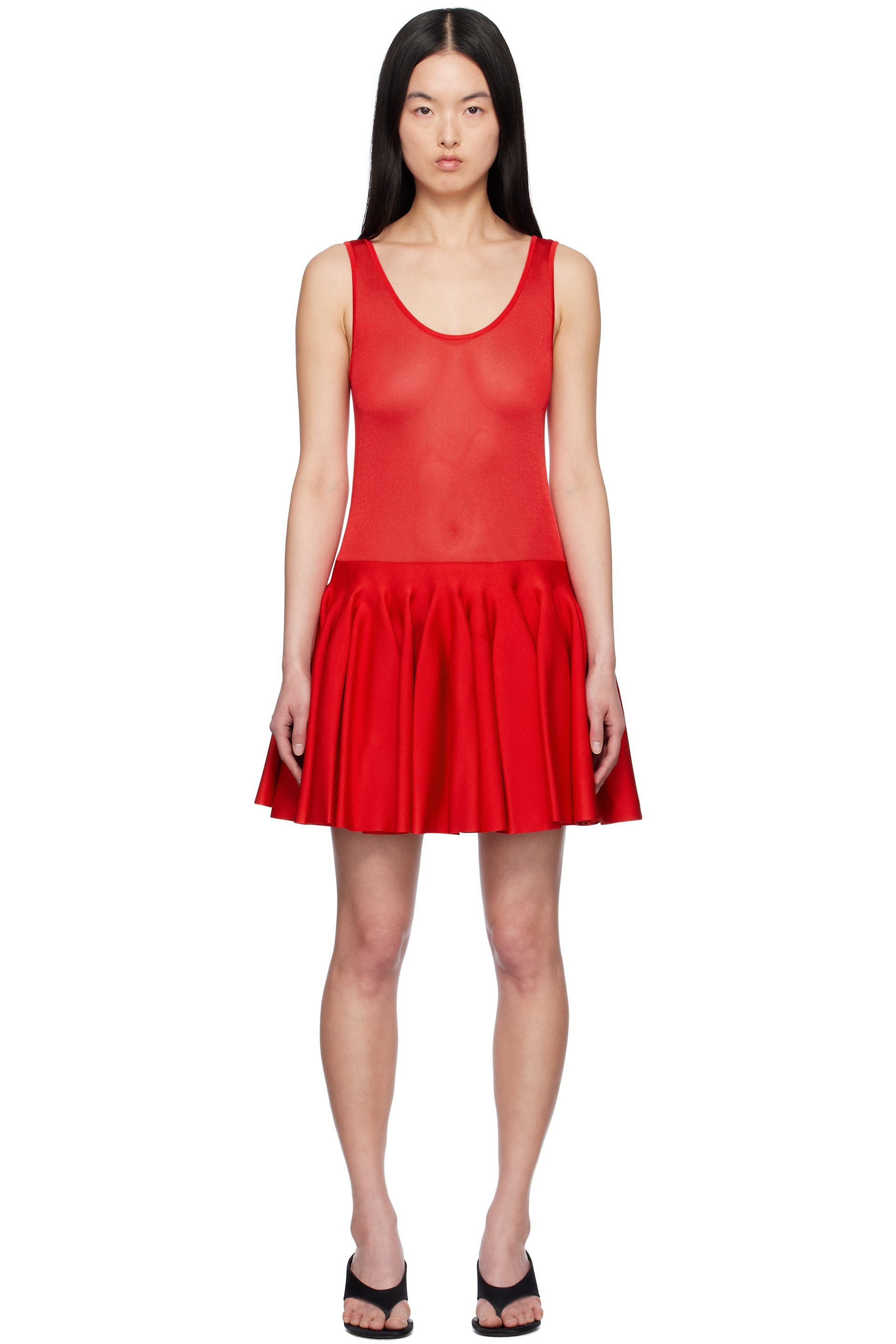 ALAÏA - Robe courte rouge en tricot à godets