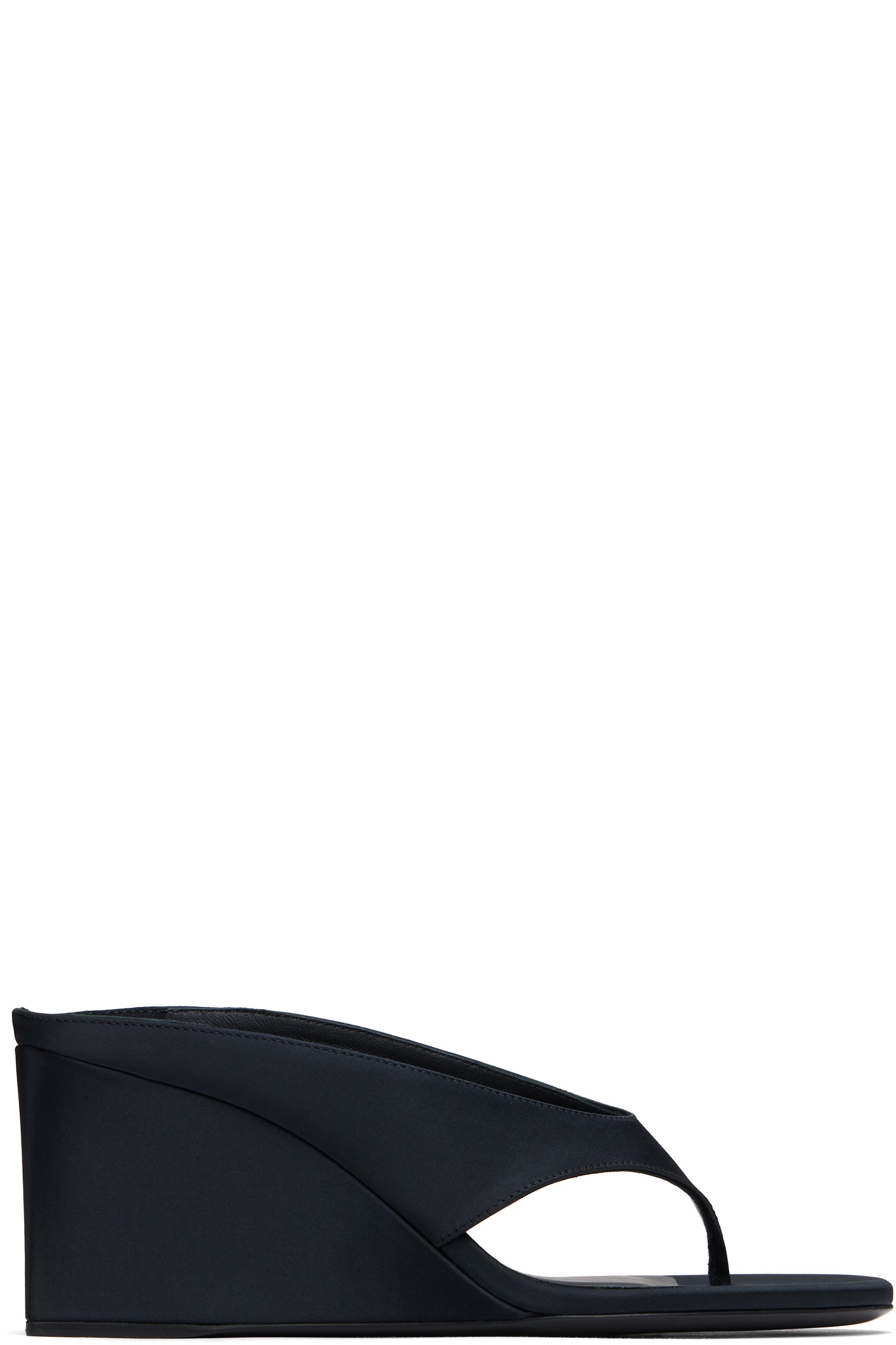ALAÏA - Mules à talon cubique noires à bride de style tong