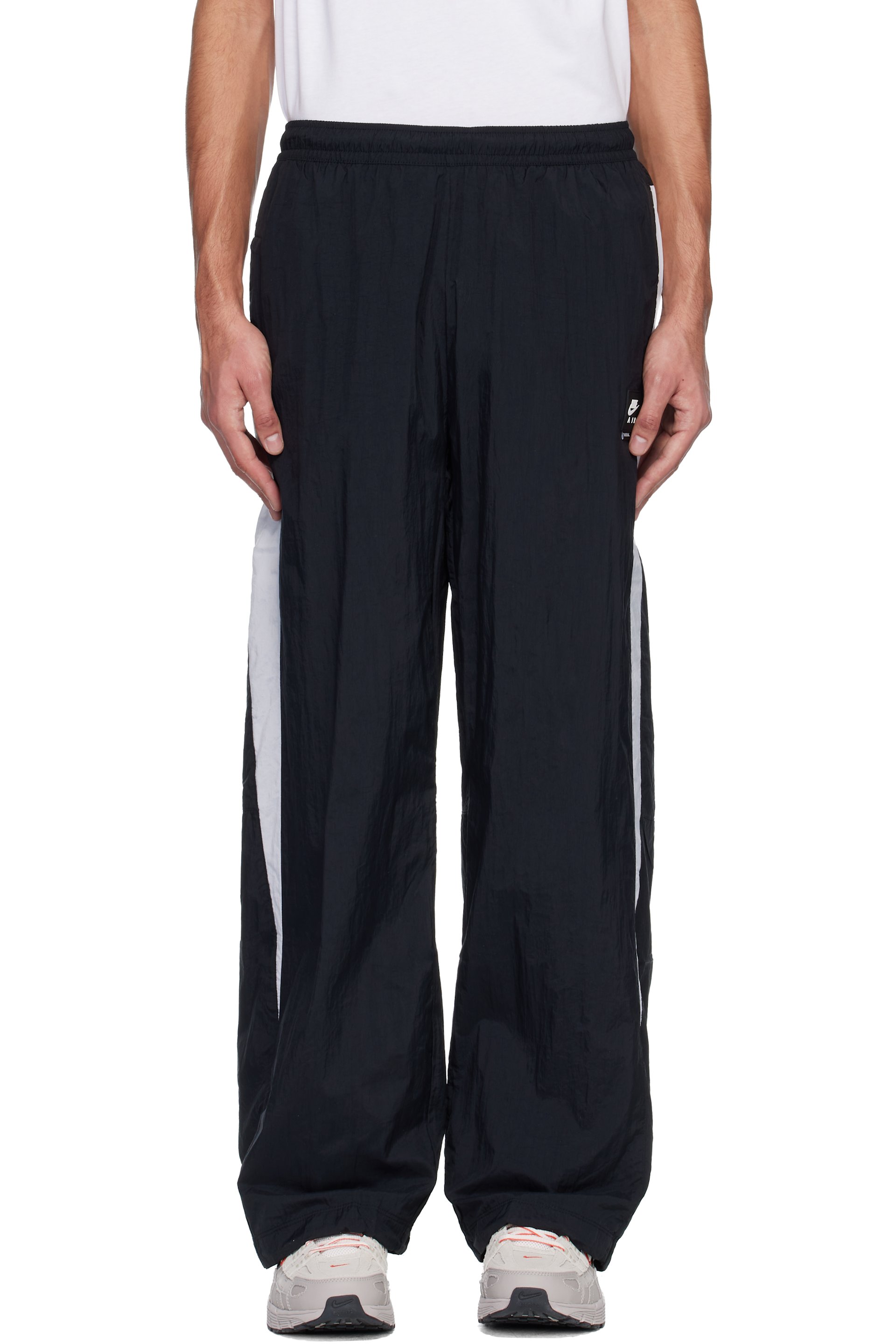 Nike - Pantalon de survêtement noir à écusson à logo Nike Air