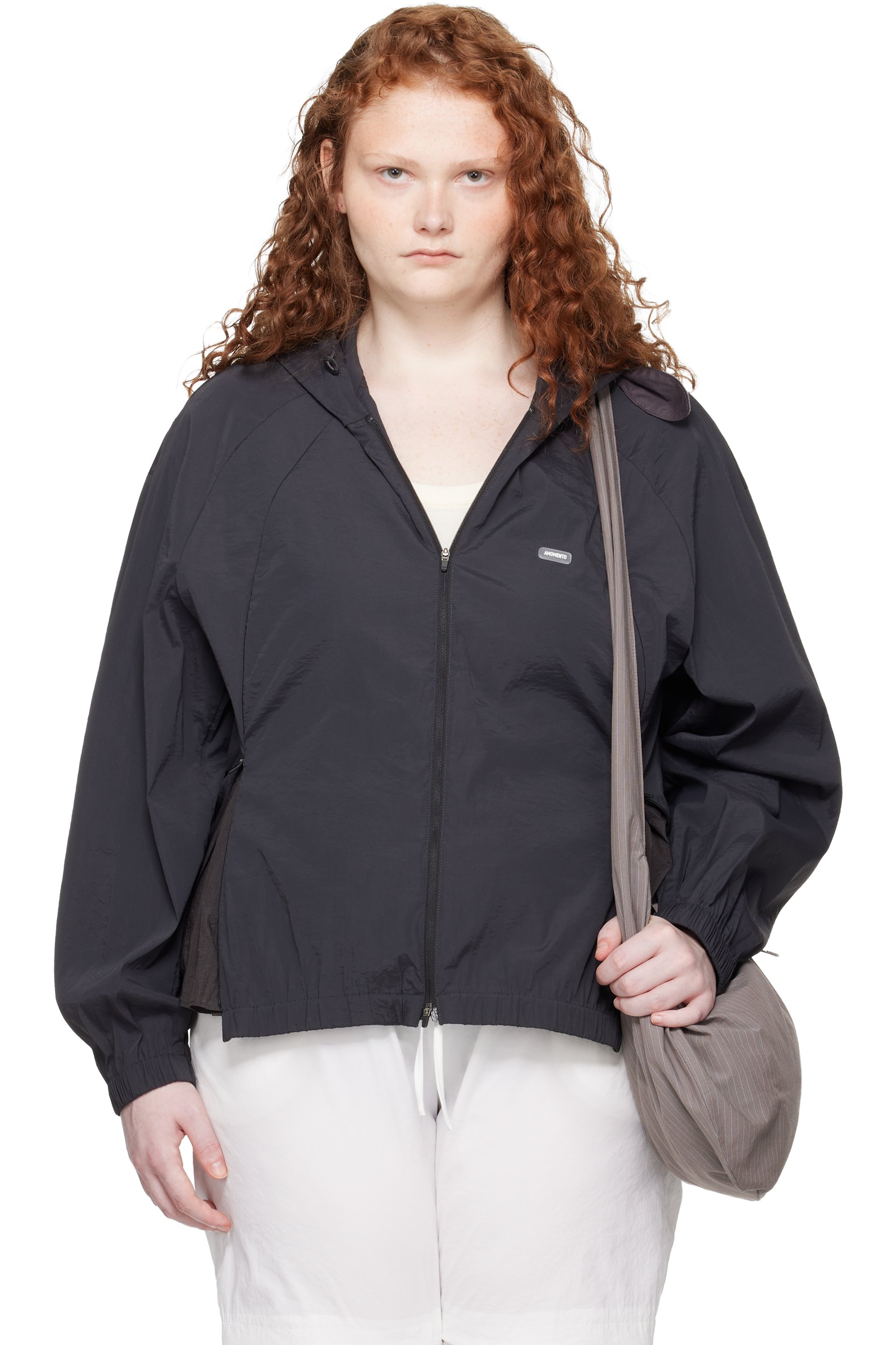 AMOMENTO - Blouson noir en nylon à manches raglan et à capuche