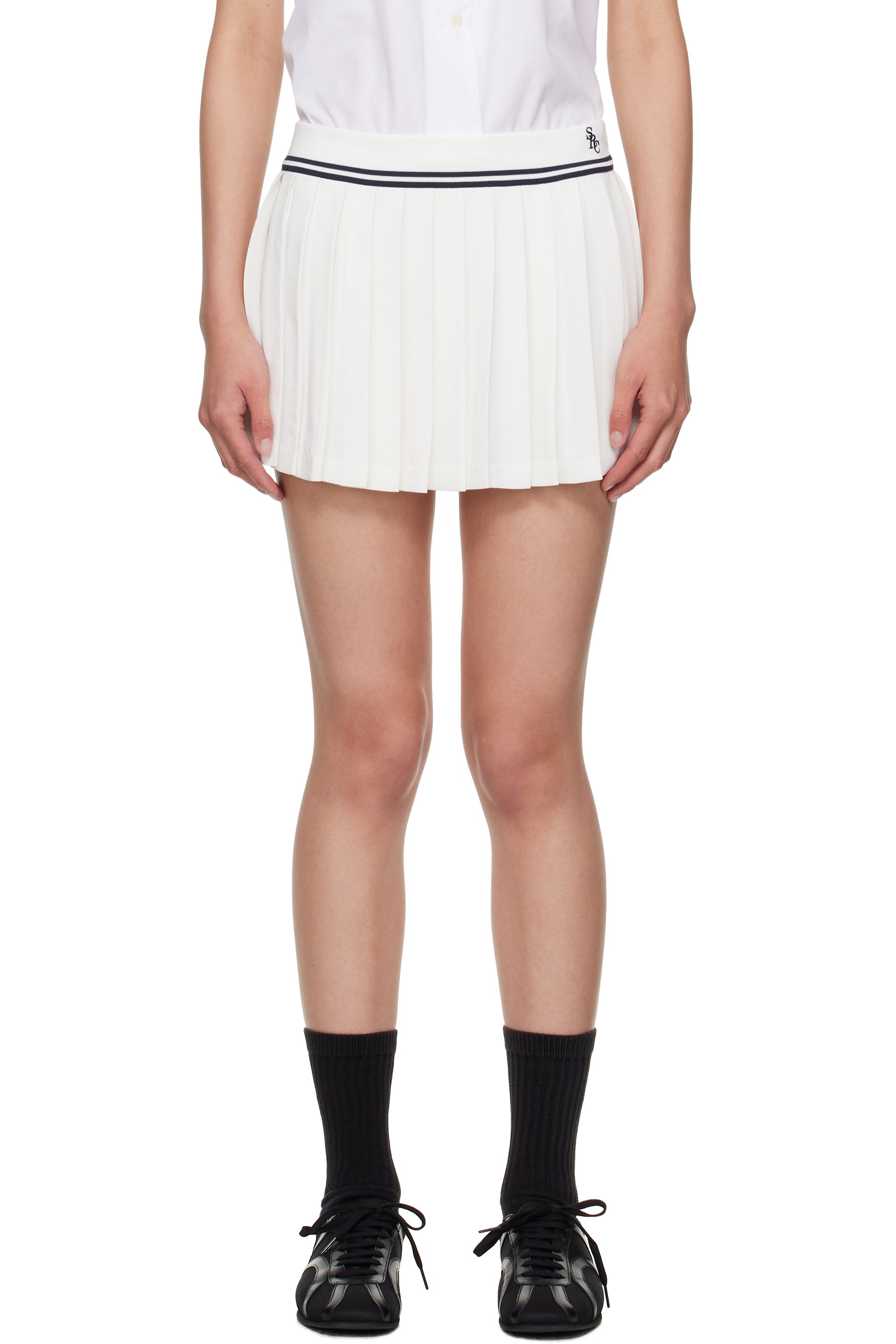 Sporty & Rich - Minijupe Abigail blanche à logo SRC