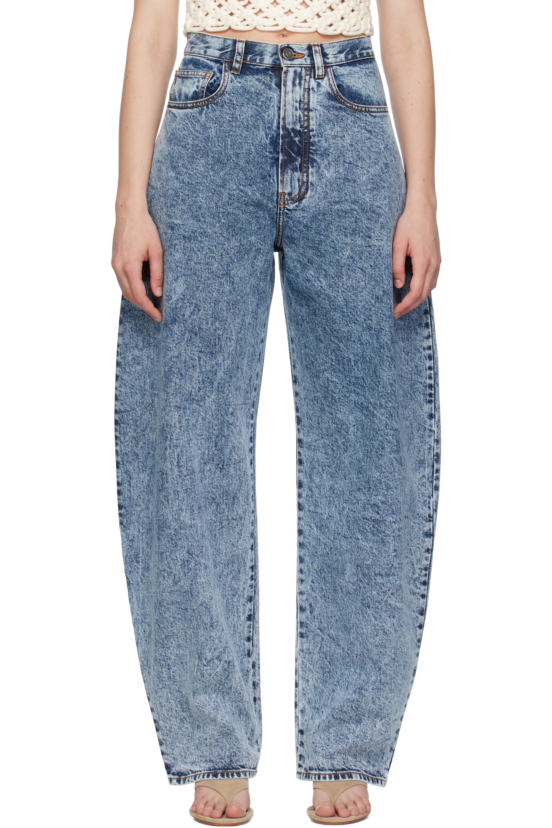 ALAÏA - Jean bleu à taille haute et à coutures extérieures incurvées