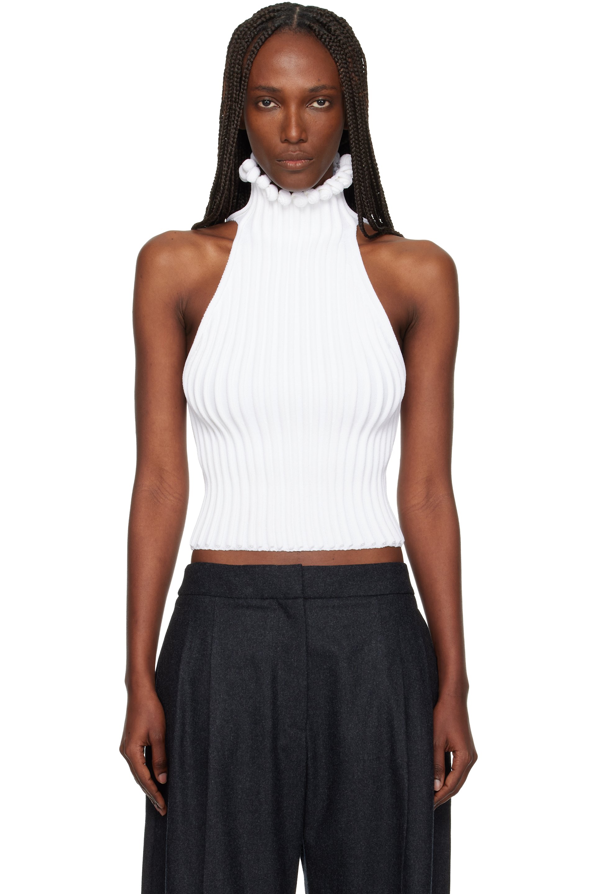 ALAÏA - Haut blanc en tricot côtelé à corsage bain de soleil texturé