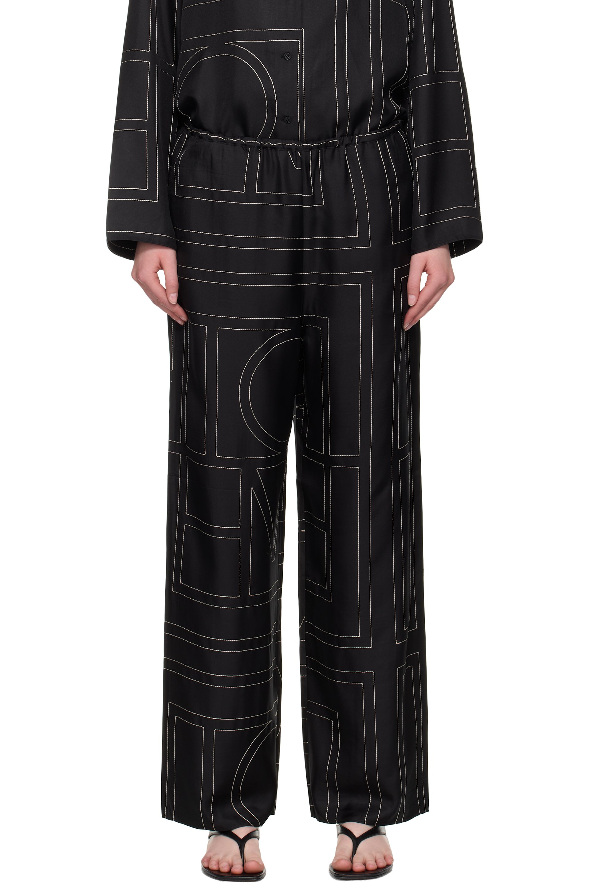 TOTEME - Pantalon de détente noir en soie à monogrammes