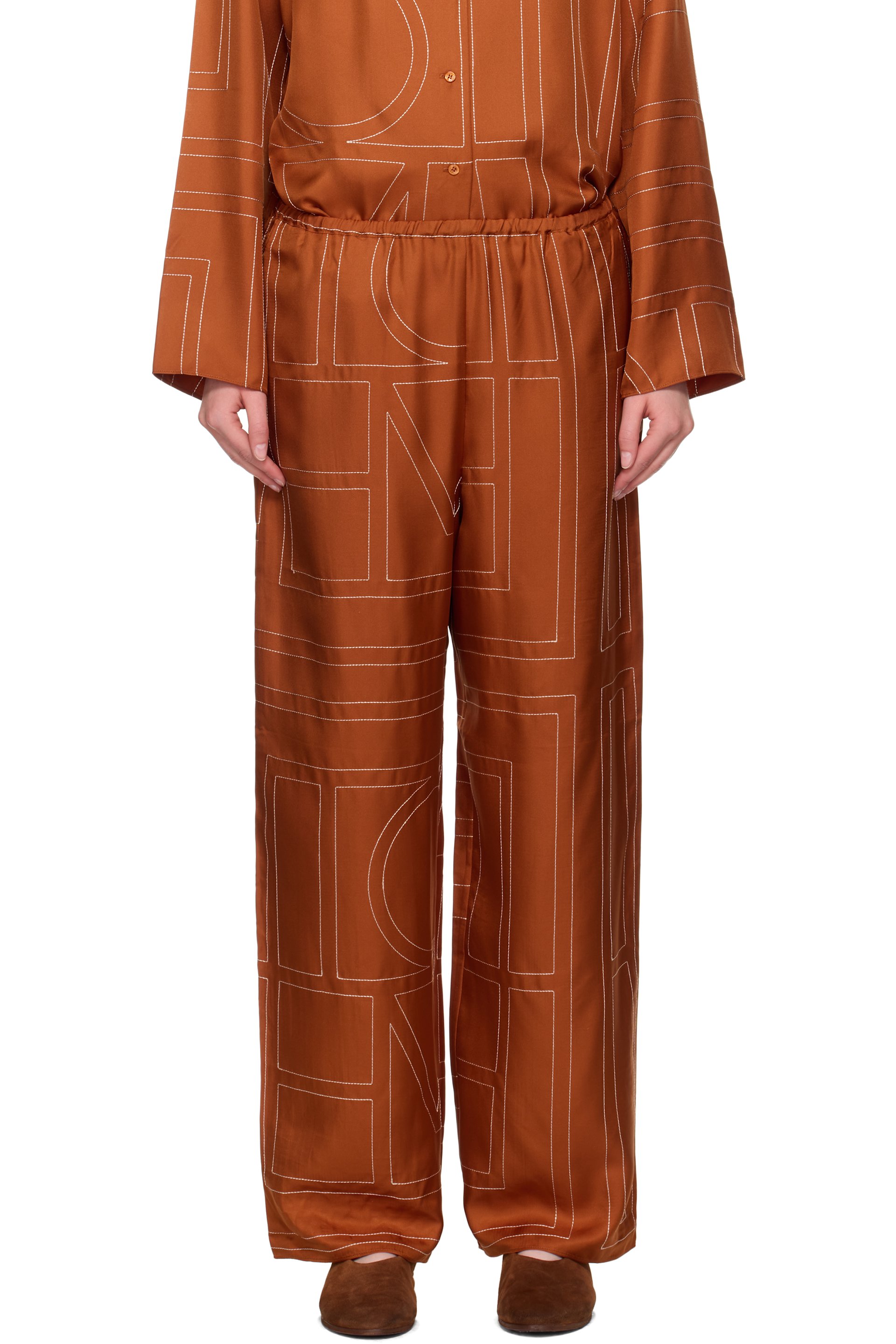 TOTEME - Pantalon de détente orange en soie à monogrammes