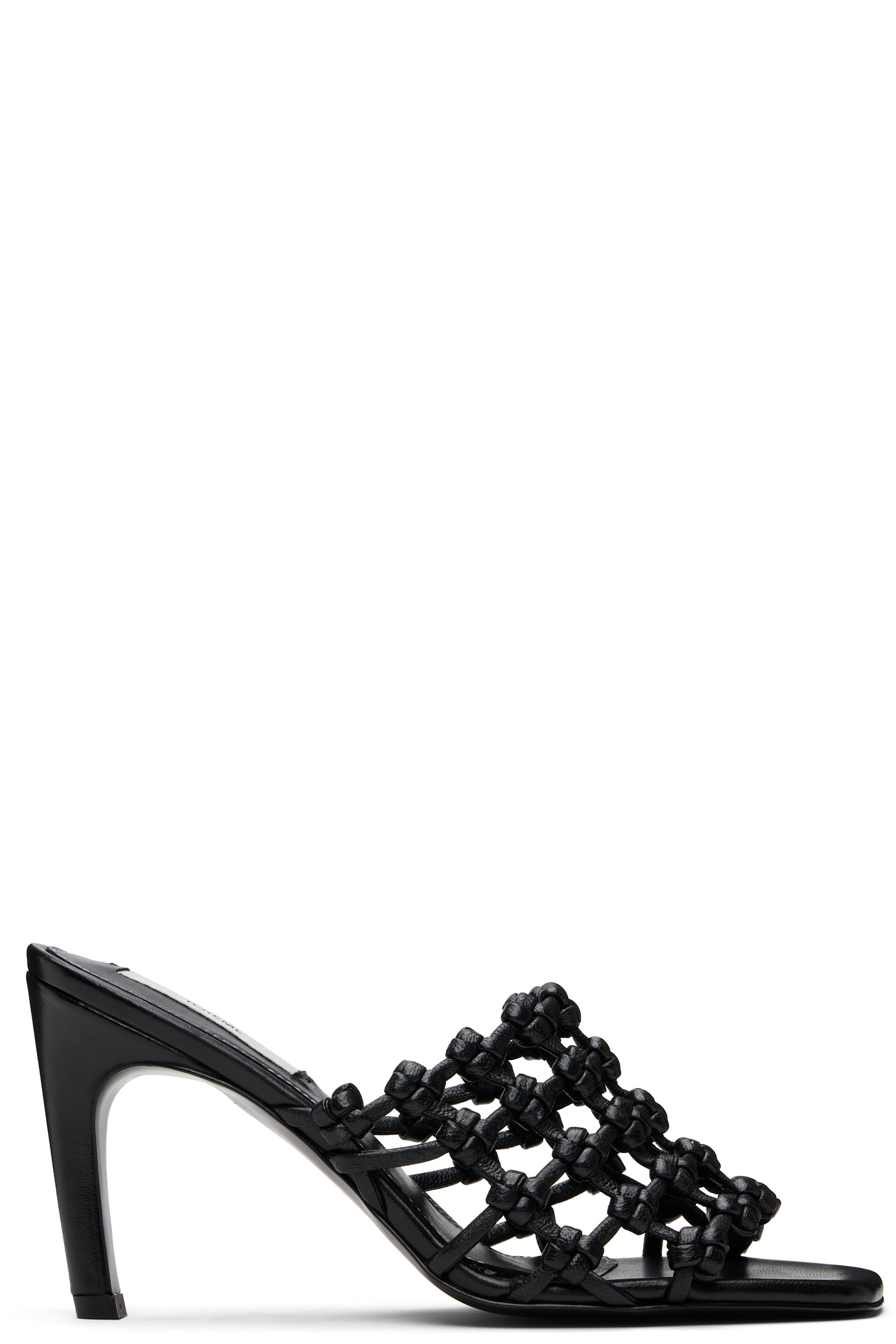 TOTEME - Mules noires en cuir à brides tressées