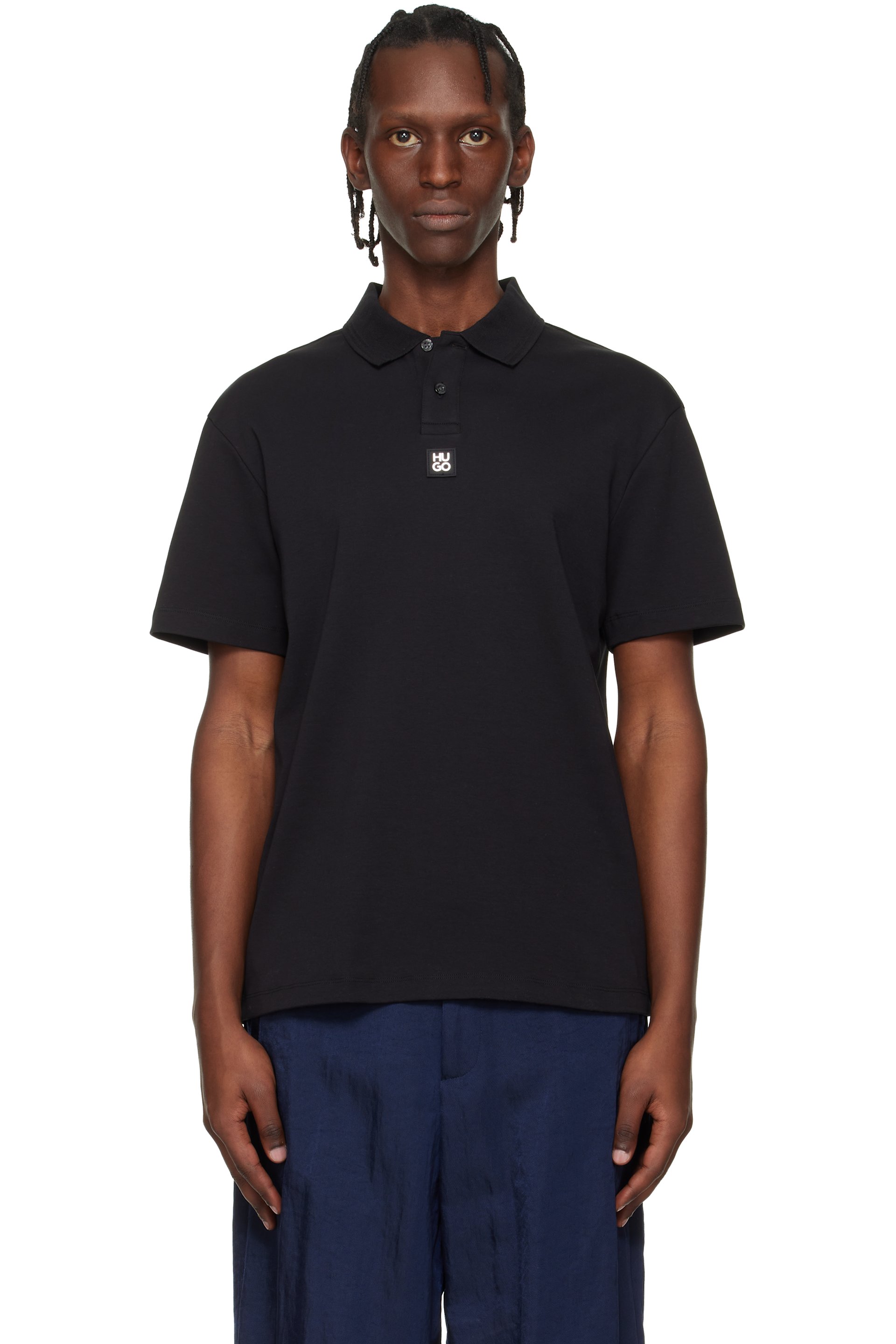 Hugo - Polo noir en jersey interlock à logo étagé