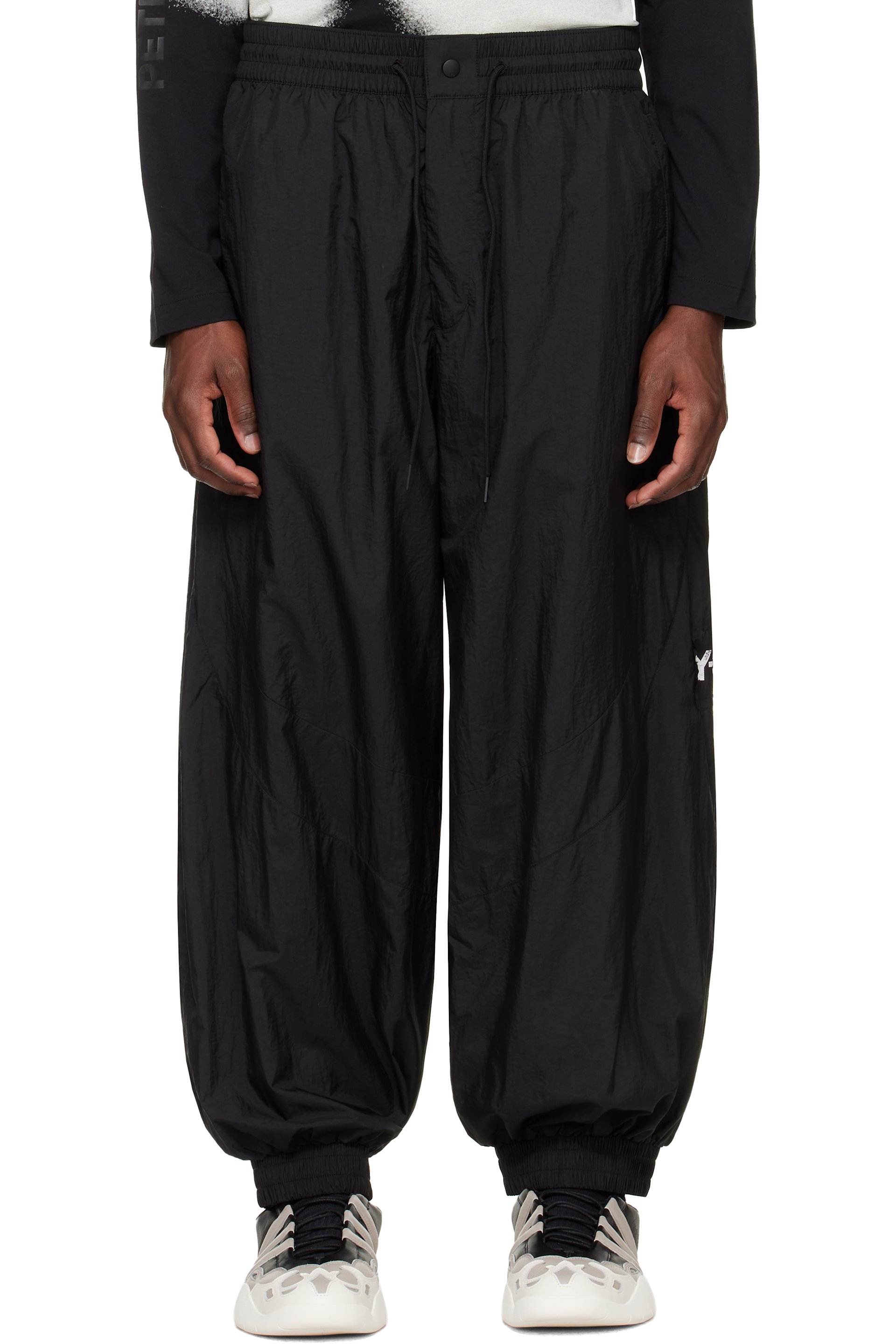 Y-3 - Pantalon de survêtement coquille noir en nylon à rayures et à bords bruts
