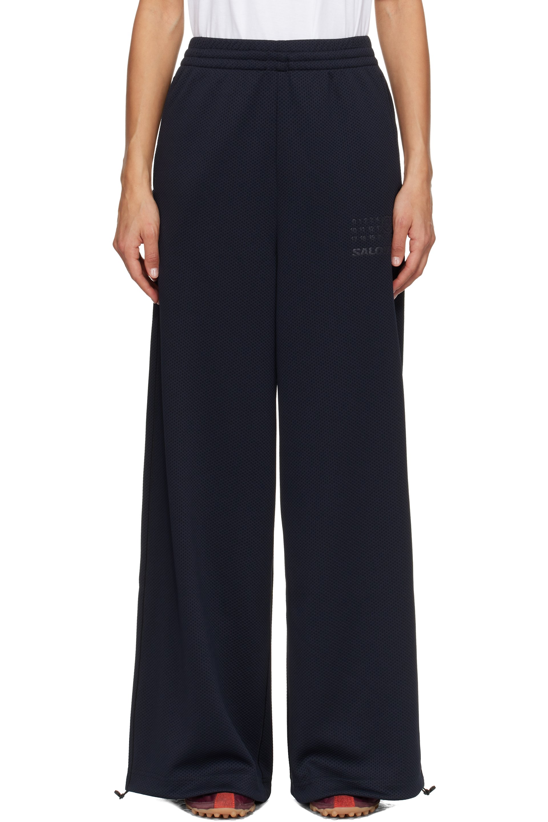 MM6 Maison Margiela - Pantalon de survêtement noir en filet édition Salomon
