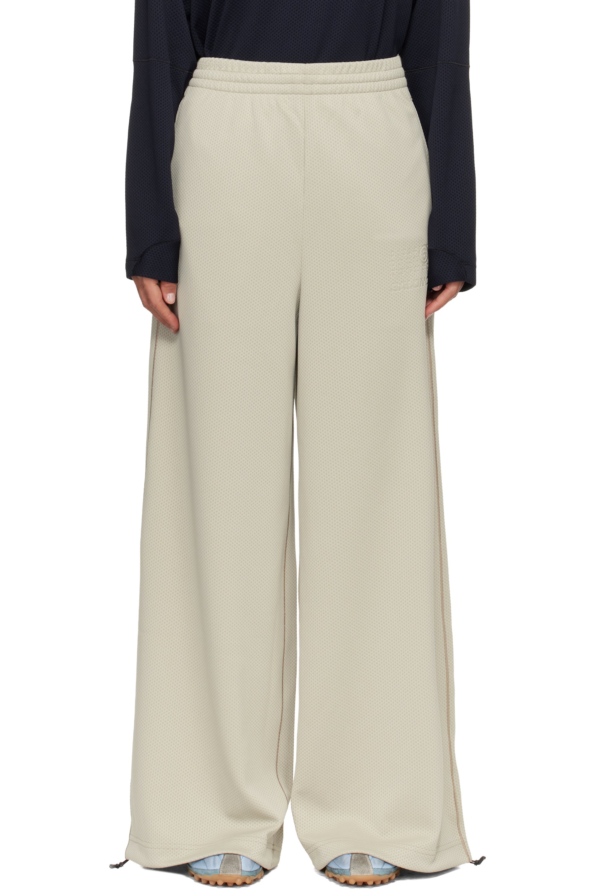 MM6 Maison Margiela - Pantalon de survêtement blanc cassé en filet édition Salomon