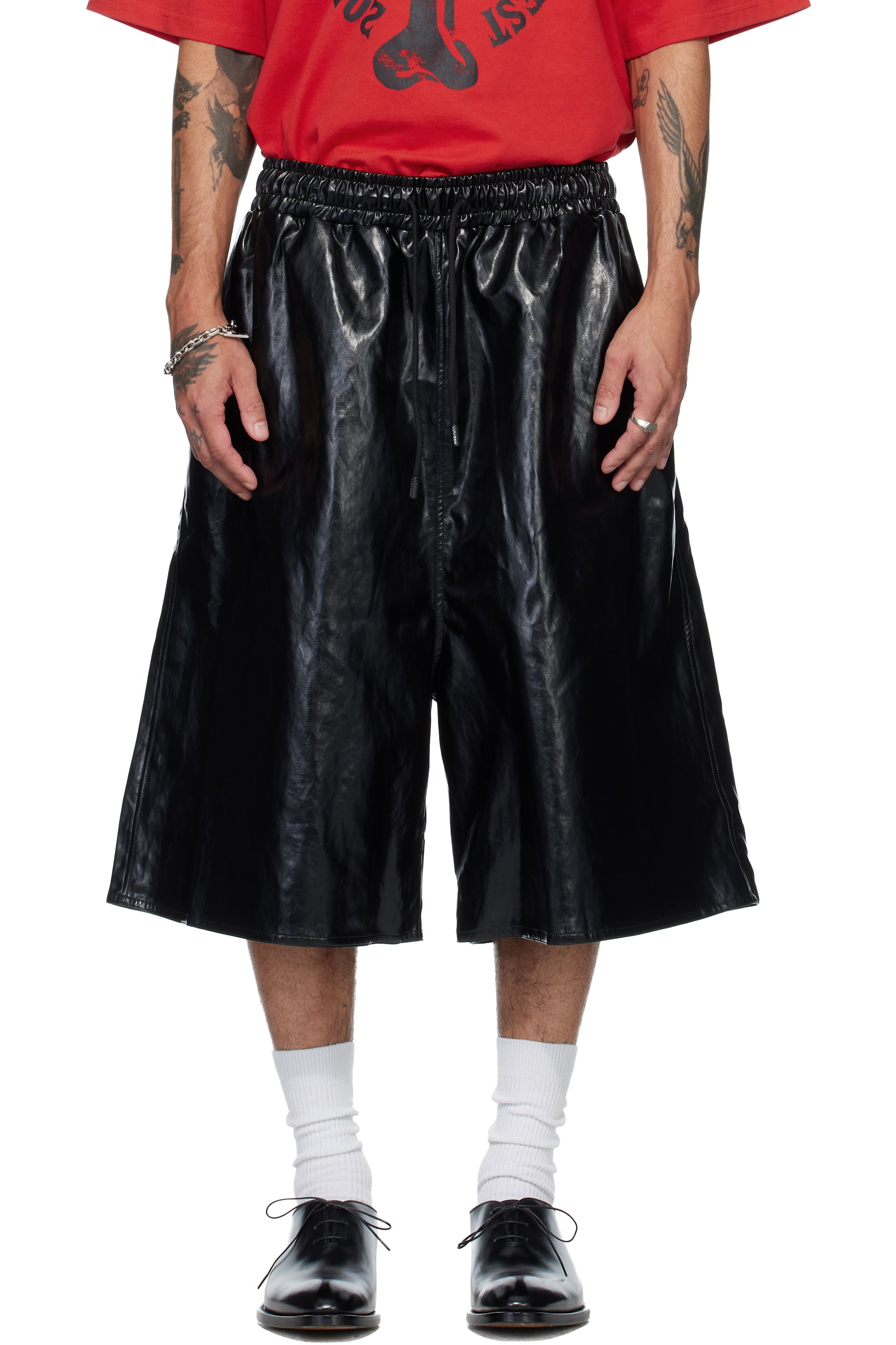 LU’U DAN - Short de style basketball noir en cuir synthétique