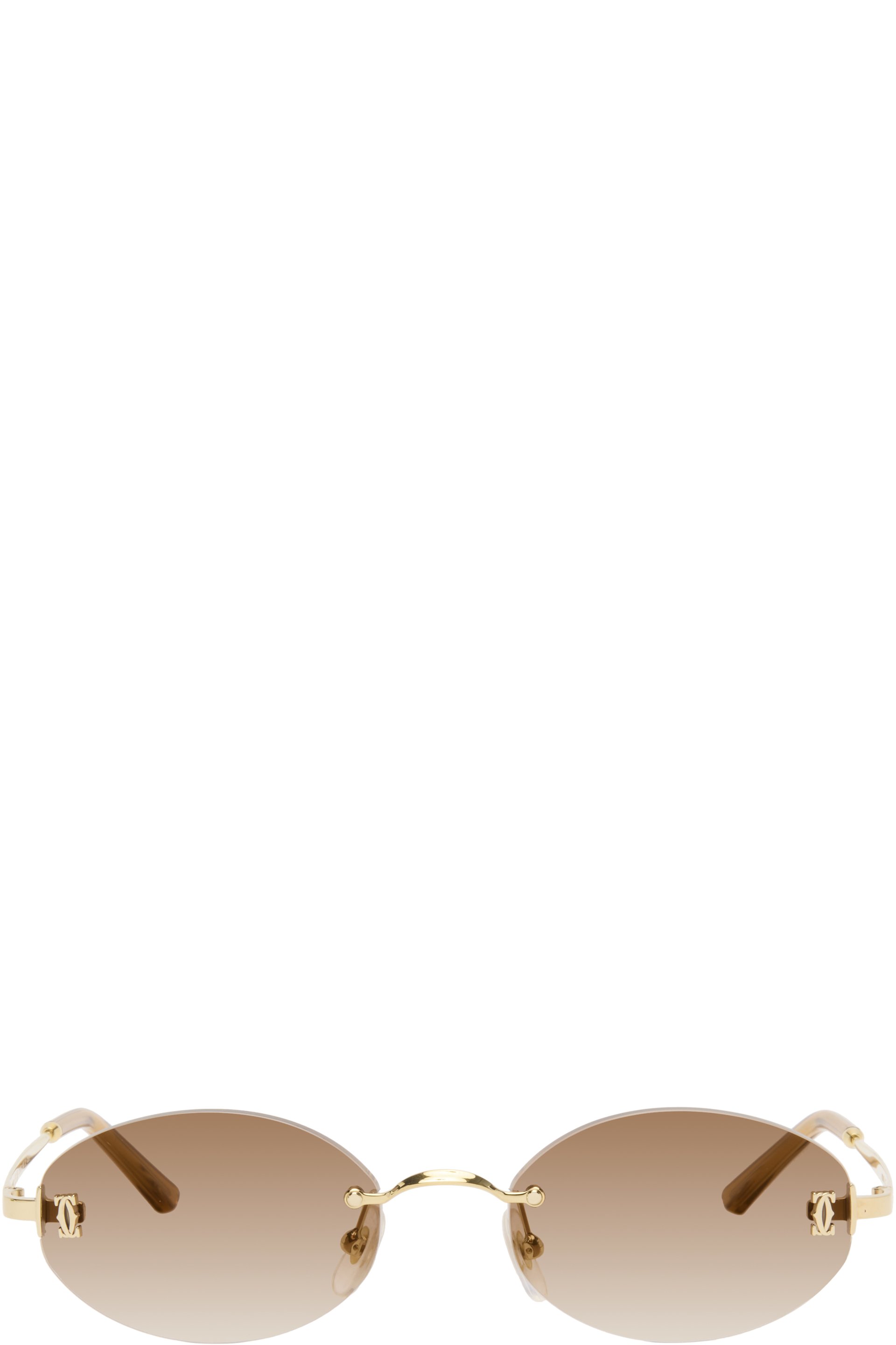 Cartier - Lunettes de soleil ovales percées dorées - Signature C