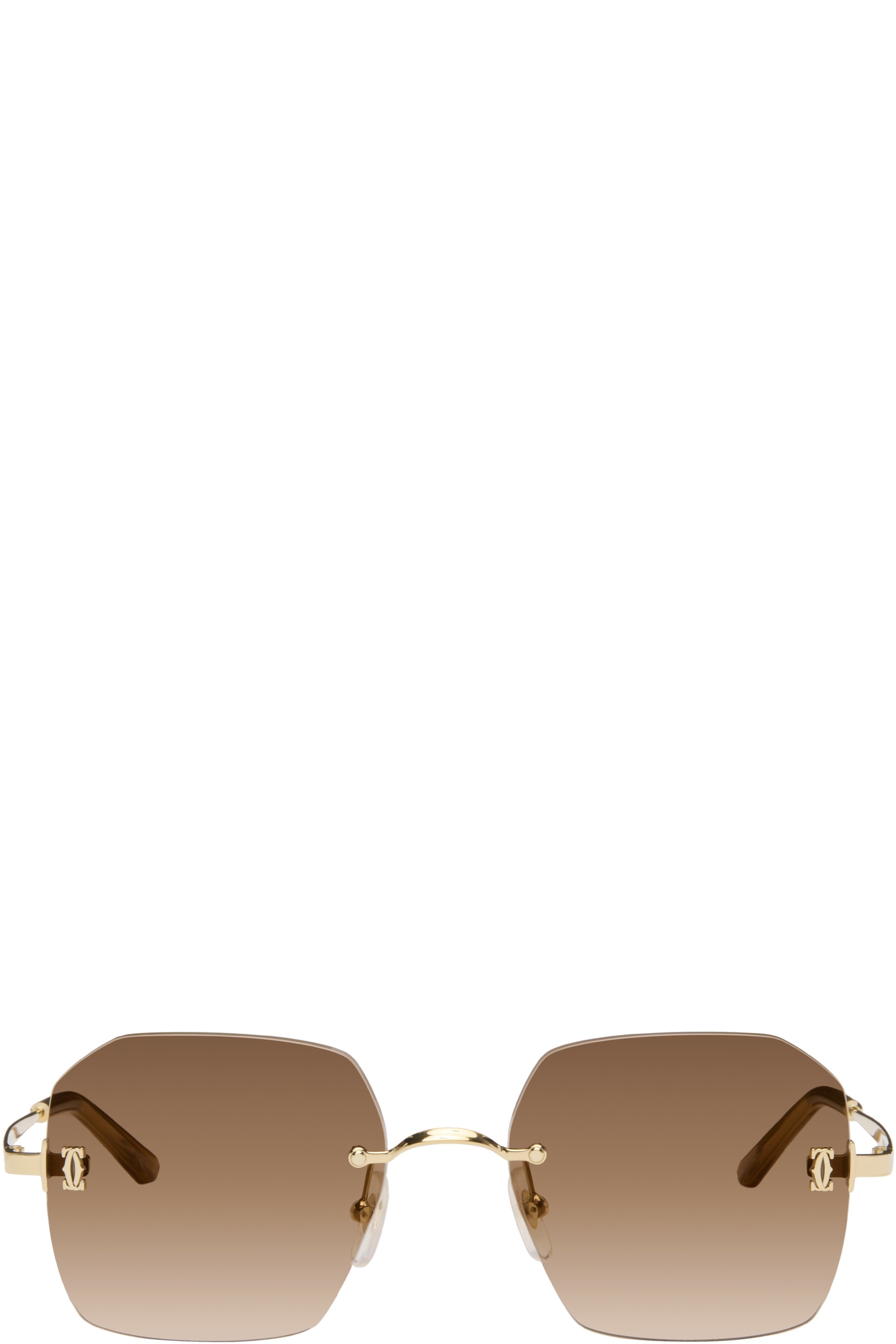Cartier - Lunettes de soleil dorées - Signature C