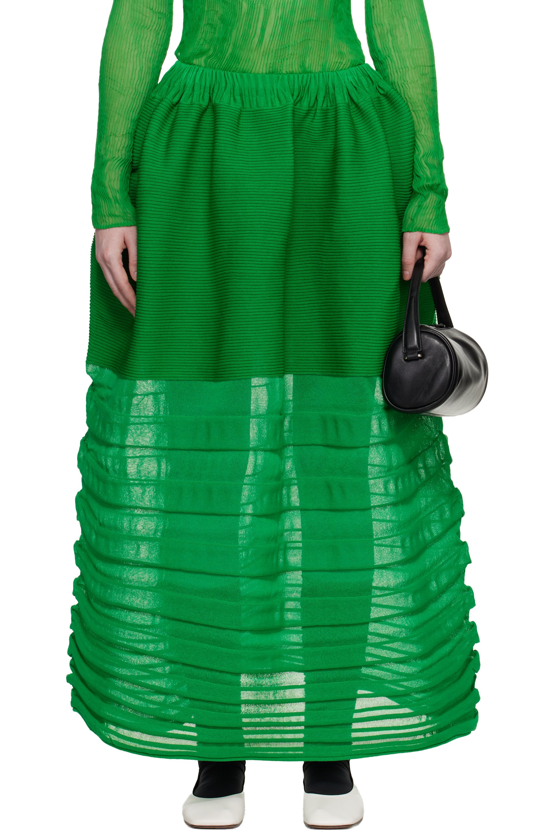 ISSEY MIYAKE: Green December Moving Knit Midi Skirt | SSENSE