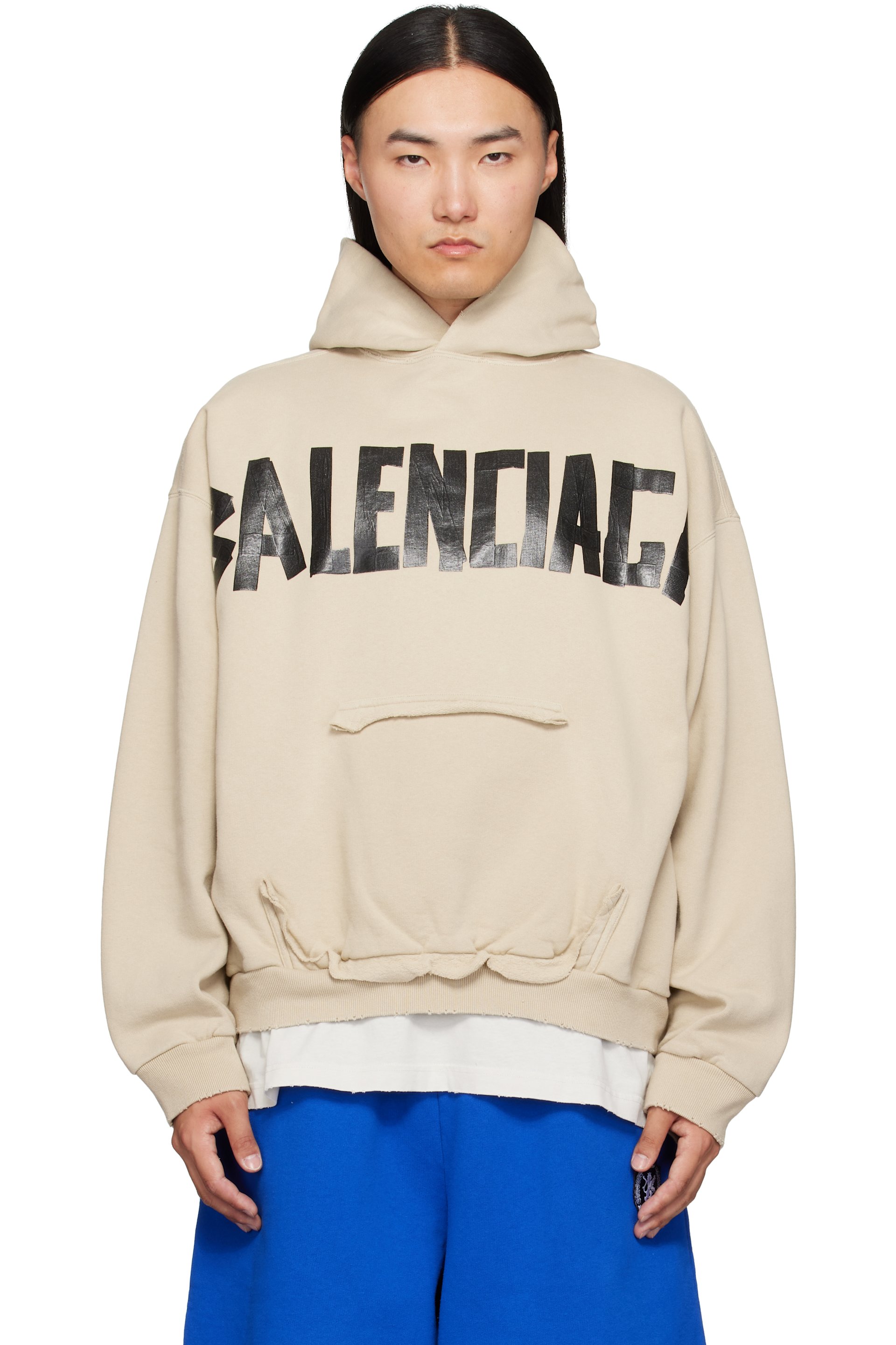 Balenciaga - Pull à capuche beige à logos de style ruban adhésif