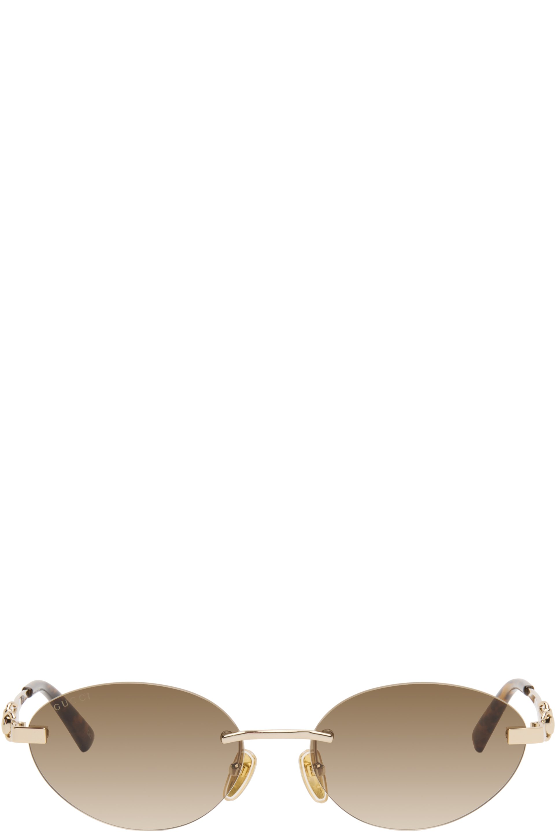 Gucci - Lunettes de soleil ovales sans monture dorées