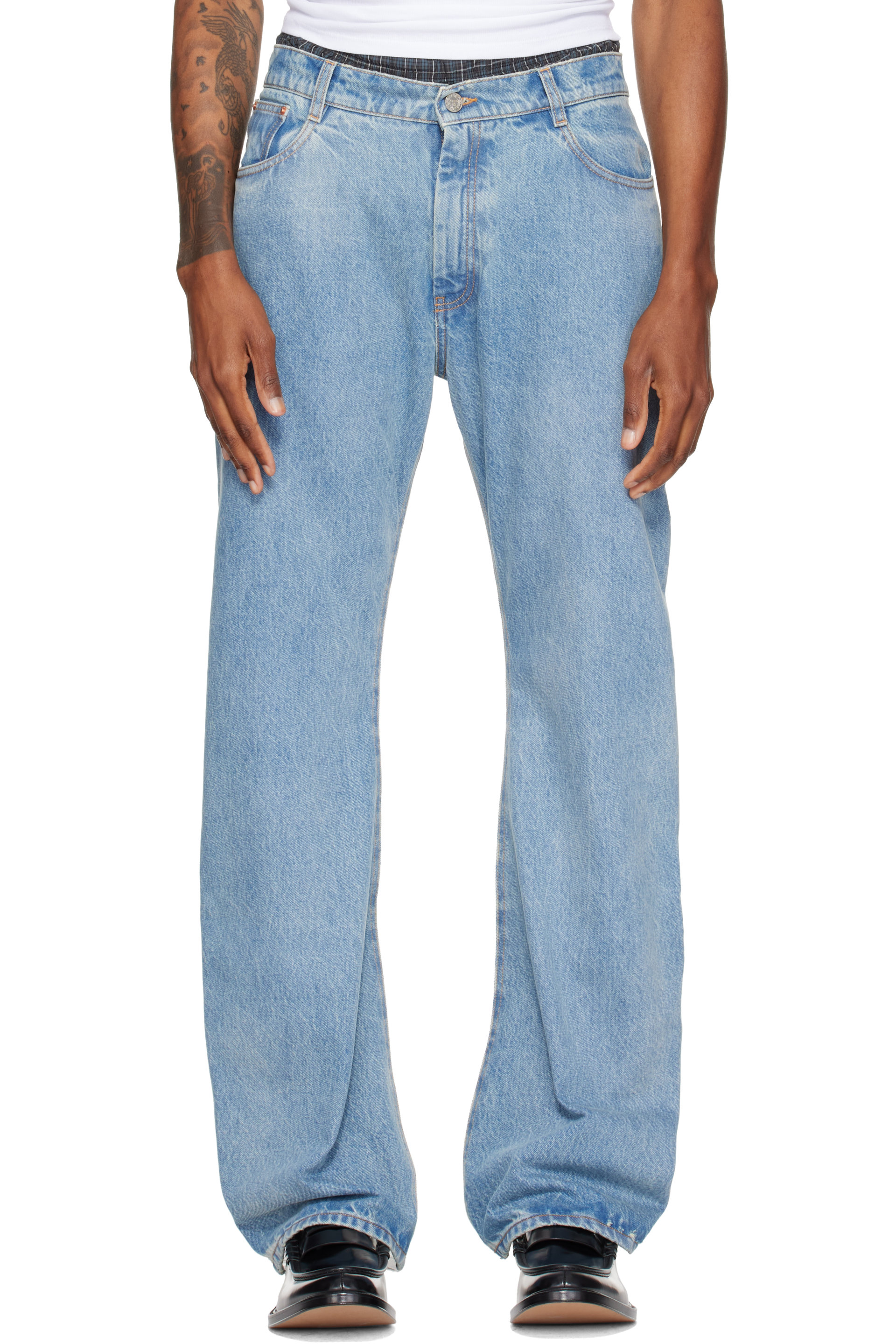 VETEMENTS - Jean bleu et transparent à jambes incurvées