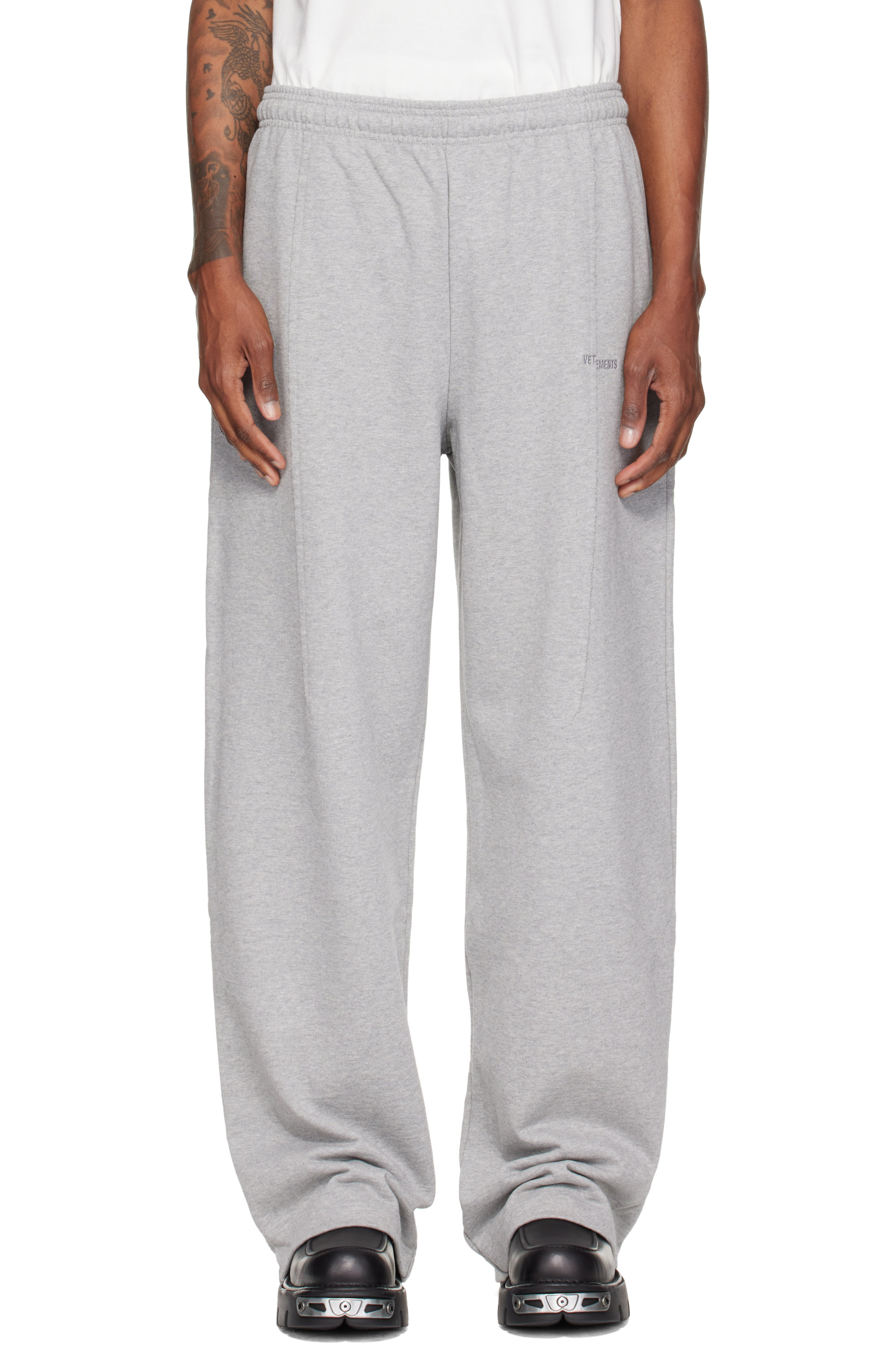 VETEMENTS - Pantalon de survêtement gris à bords bruts
