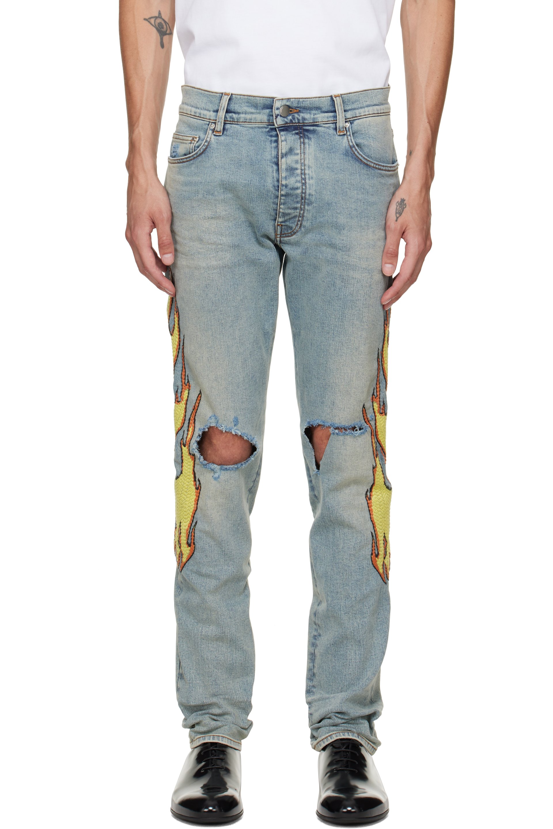 AMIRI - Jean skinny bleu à images brodées