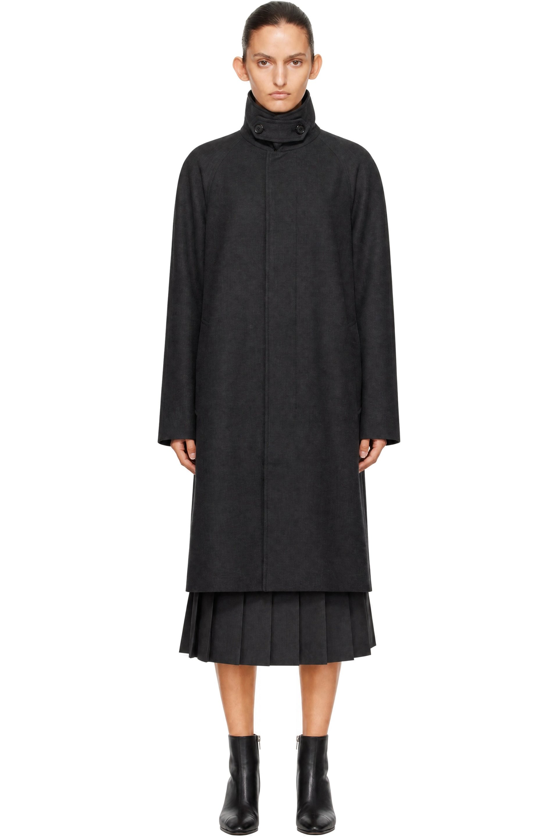 Dunst - Body: 59% wool, 41% polyester. Lining: 100% polyester.