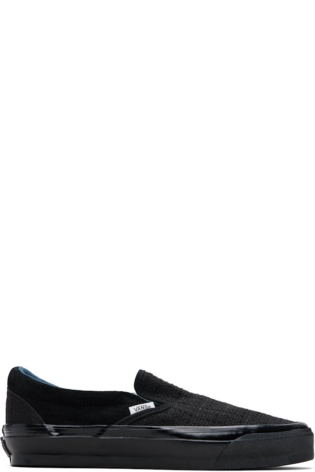Vans — Black Premium Classic Slip-On Sneakers