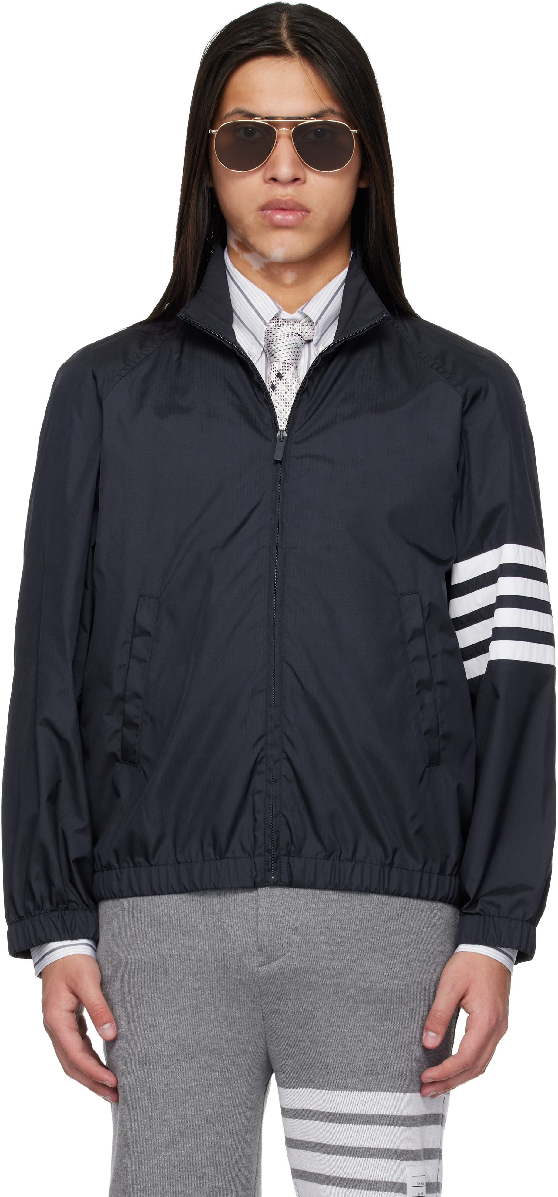 Thom Browne: Navy Shiny Ripstop Raglan 4-Bar Track Jacket | SSENSE