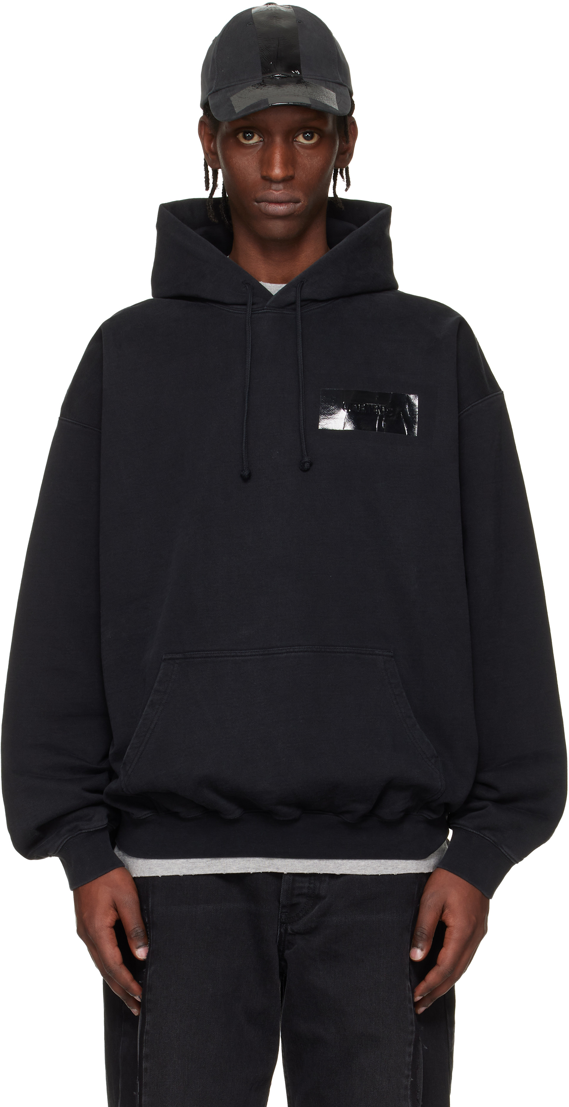 VETEMENTS: Black Taped Logo Hoodie | SSENSE