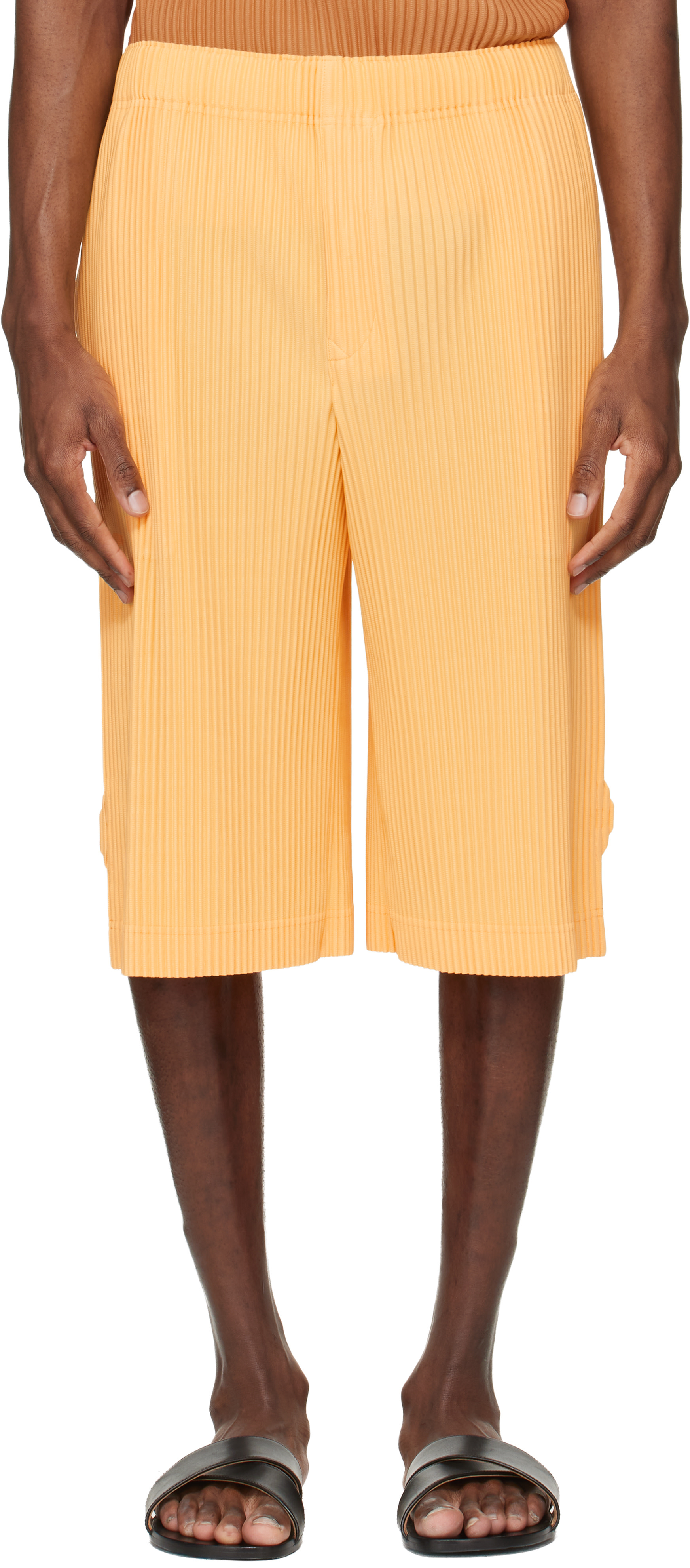 HOMME PLISSÉ ISSEY MIYAKE: Yellow Wear Or Wrap Shorts | SSENSE