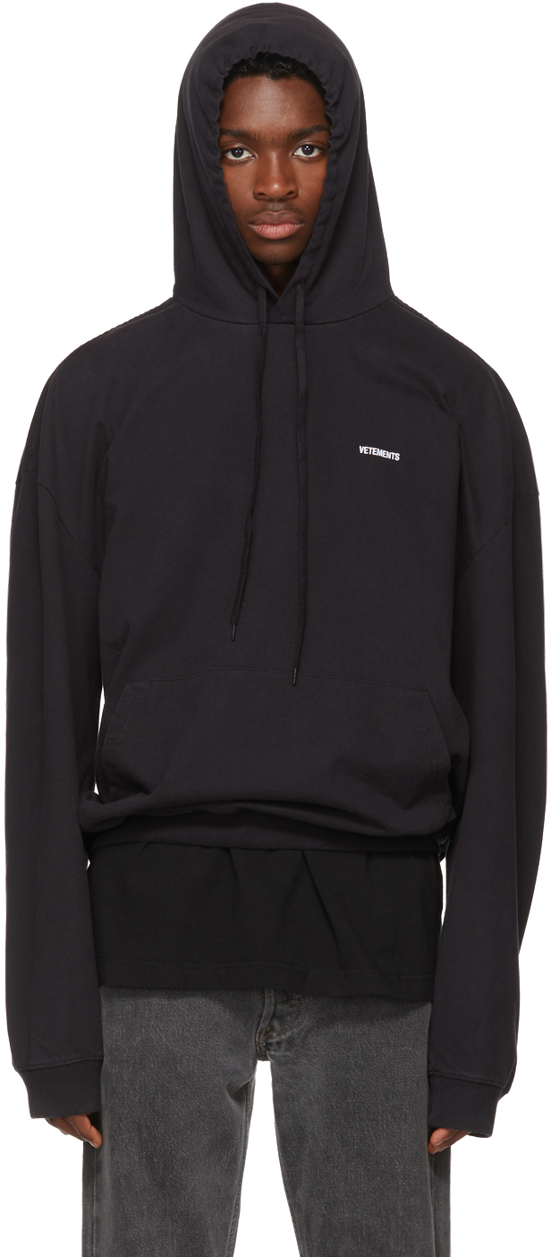 VETEMENTS: Black Embroidered Logo Hoodie | SSENSE