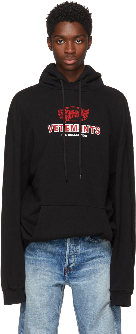 VETEMENTS: Black Graphic Logo Oversized Hoodie | SSENSE