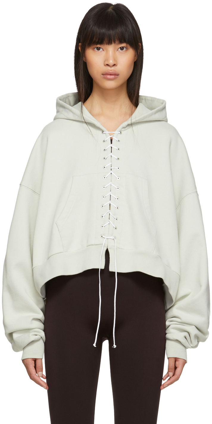Unravel: Green Lace-Up Hoodie | SSENSE