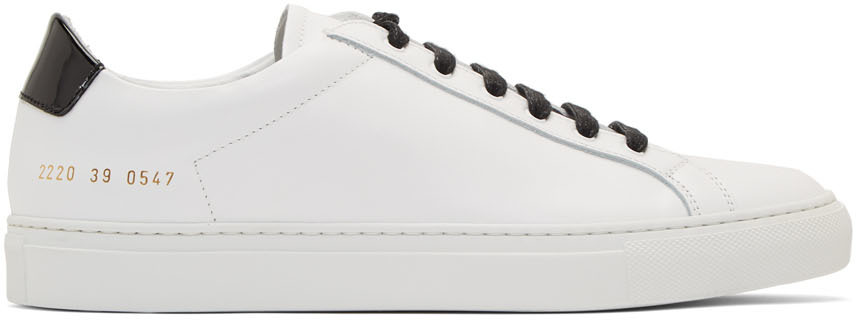 Common Projects: White & Black Retro Low Glossy Sneakers | SSENSE