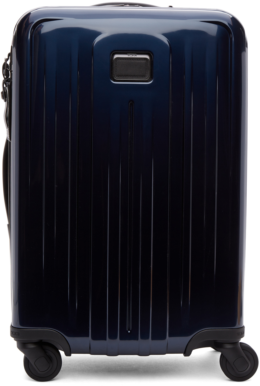 Tumi Navy International Expandable 4 Wheeled CarryOn Suitcase