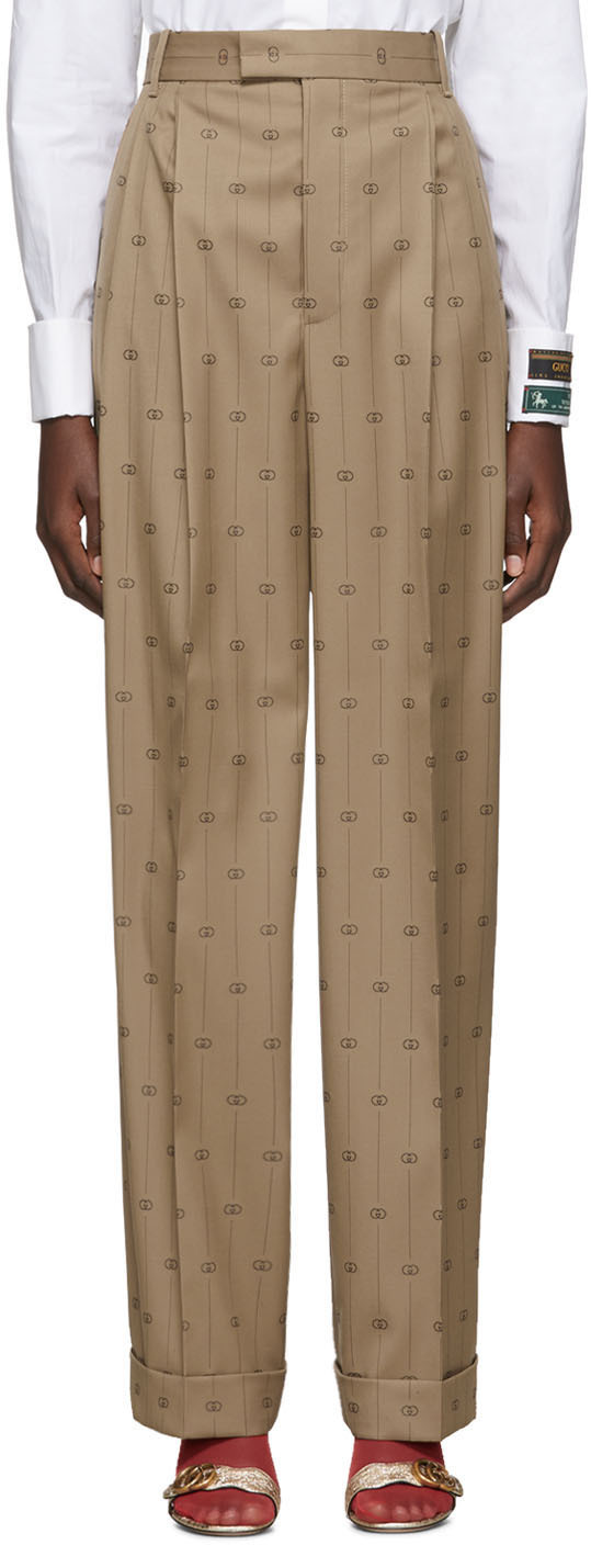 Gucci: Beige Pinstripe GG Trousers | SSENSE
