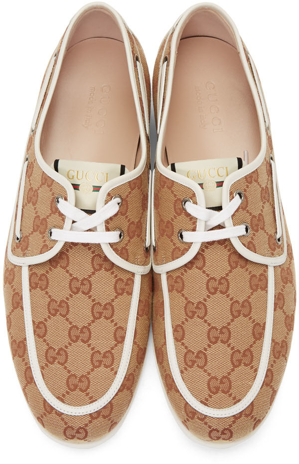 white canvas boat shoes