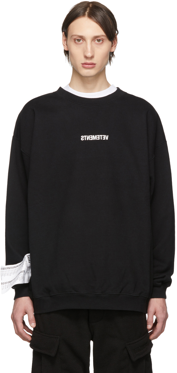 VETEMENTS: Black Inverted Logo Sweatshirt | SSENSE