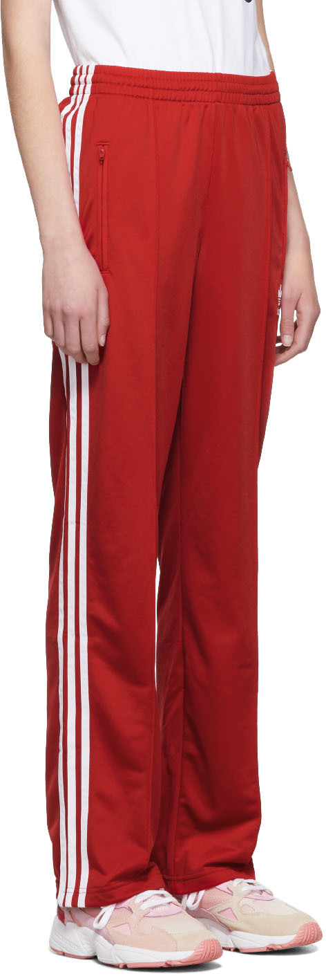 red adidas track pants