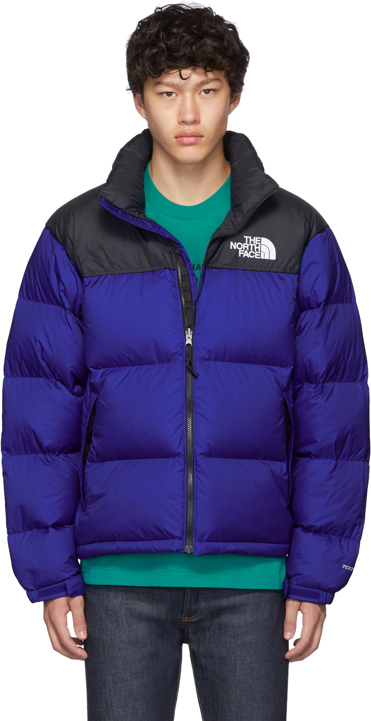 blue and black north face jacket