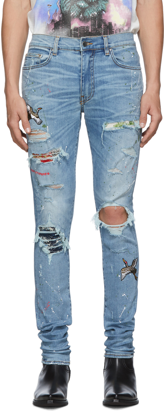 AMIRI: Blue Art Patch Crane Jeans | SSENSE