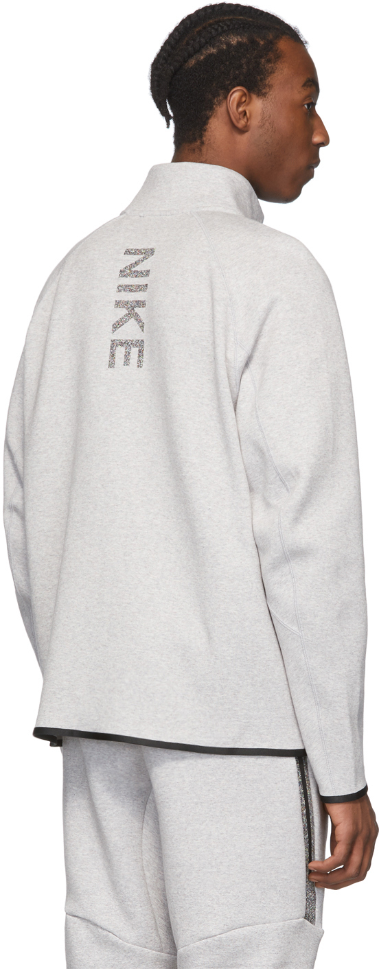 gray nike zip up jacket