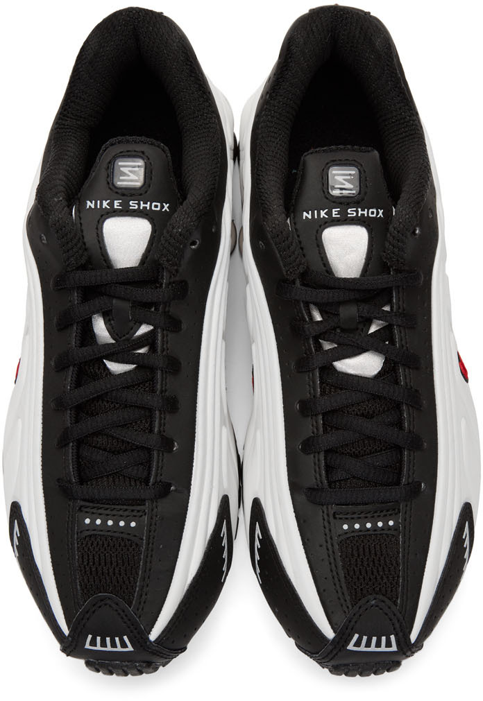 nike black shox r4 sneakers