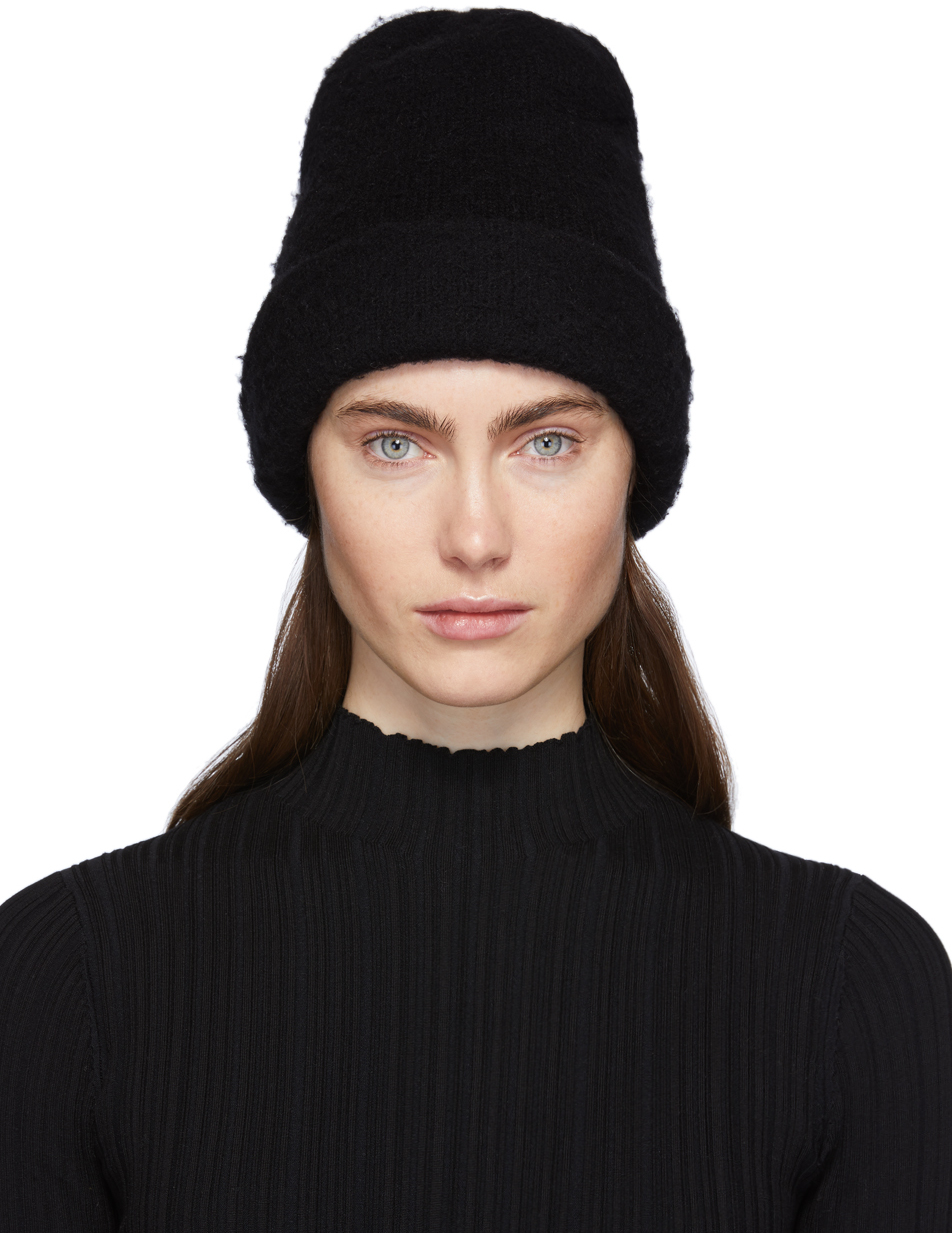 Acne Studios: Black Pilled Beanie | SSENSE