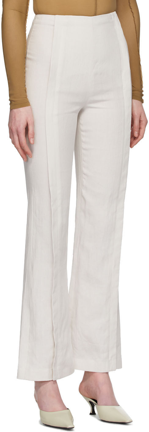 white linen flared trousers