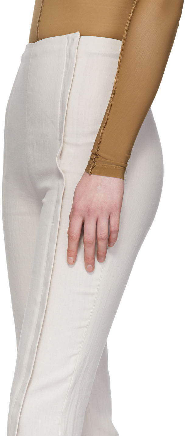 white linen flared trousers