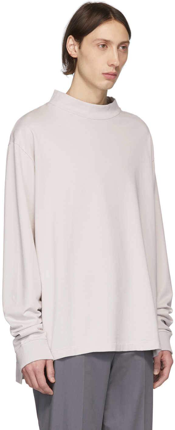 white mock neck sweatshirt