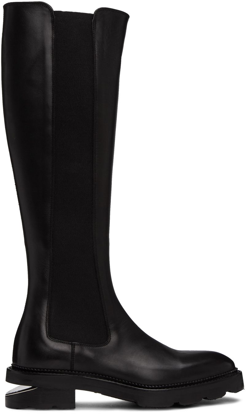 black riding boots with gold hardware