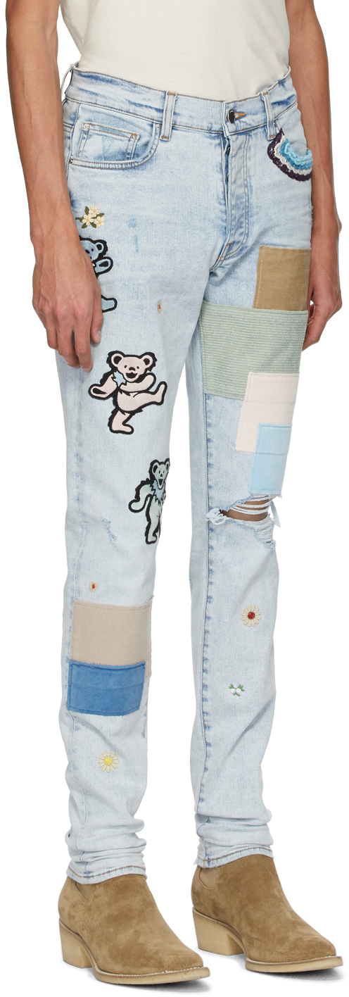amiri blue thrasher jeans