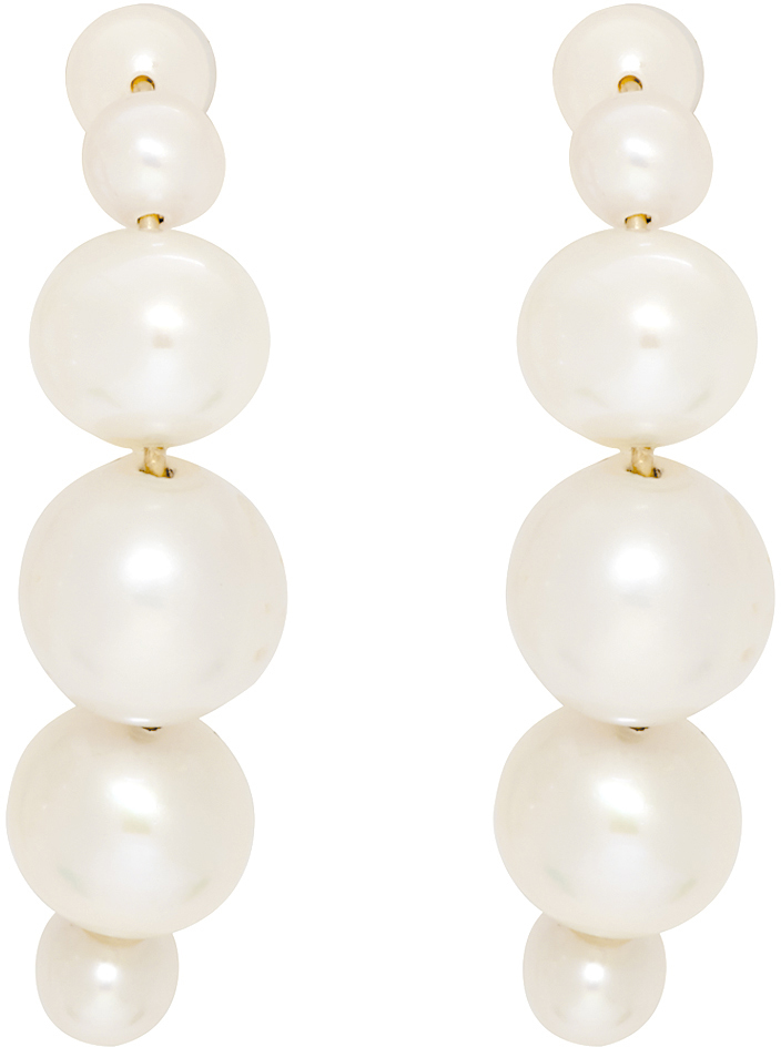 Saskia Diez: Gold Drop Pearl Hugging Earrings | SSENSE