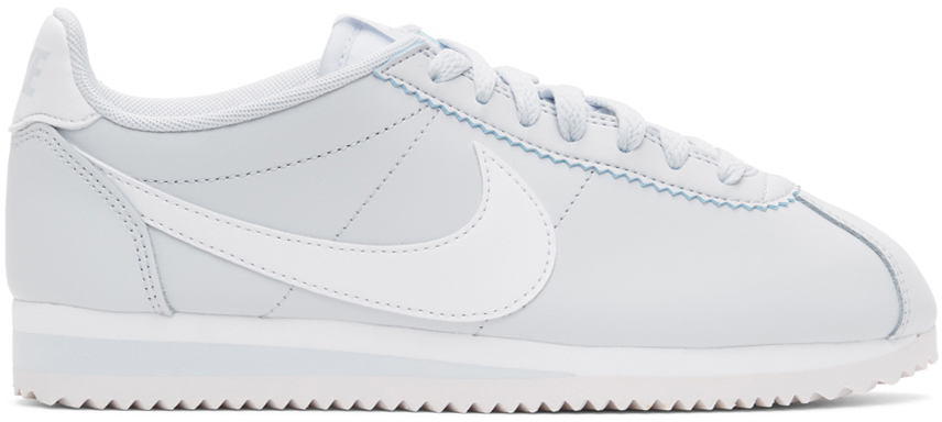 grey and white nike cortez