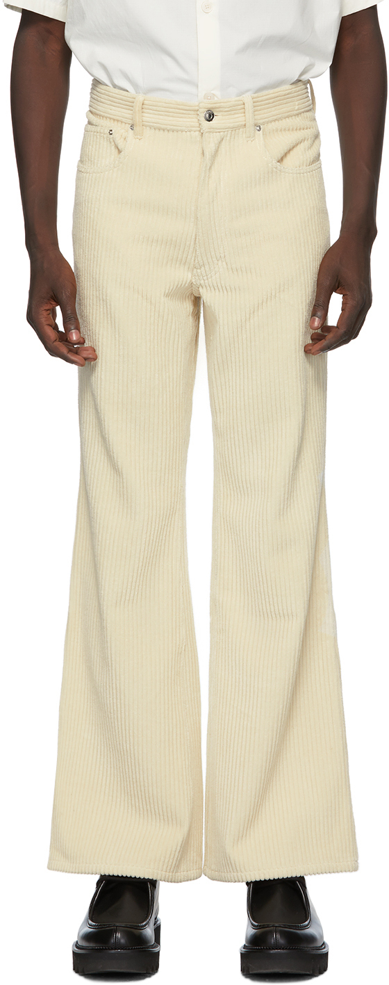 flared beige trousers